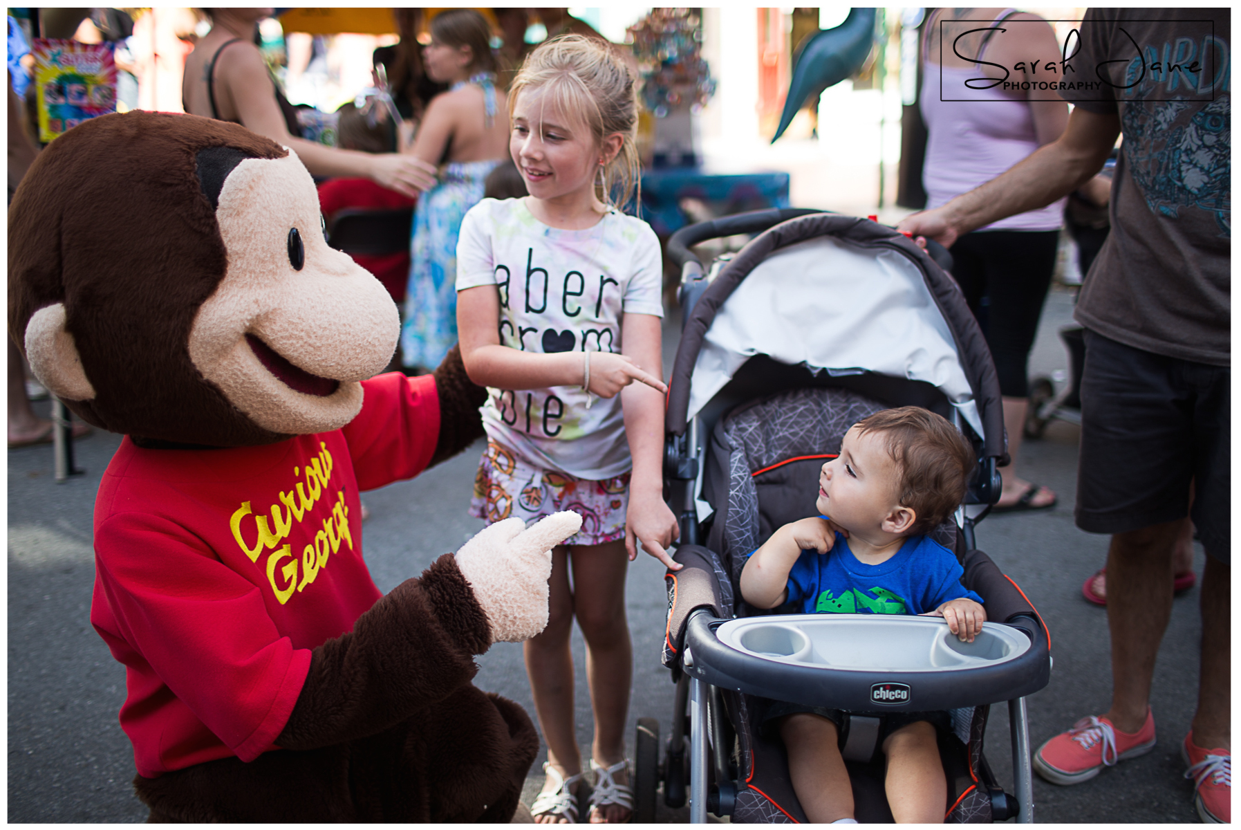 Image of Curious George Mascot and kids