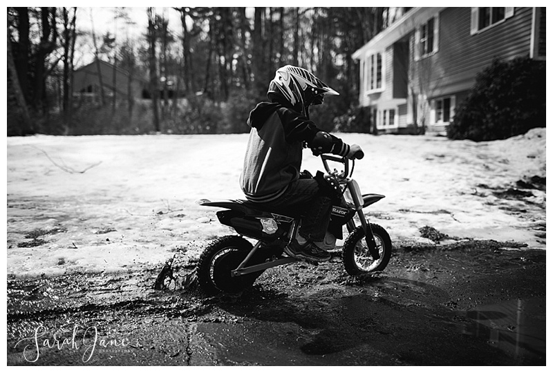 Riding Bikes in the mud during Spring thaw in Maine Family Documentary Photography