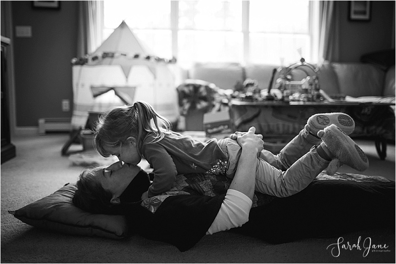 Mom and Daughter kiss Sarah Jane Photography