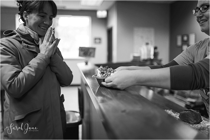 an excited customer at Catbird Creamery Sarah Jane Photography Maine