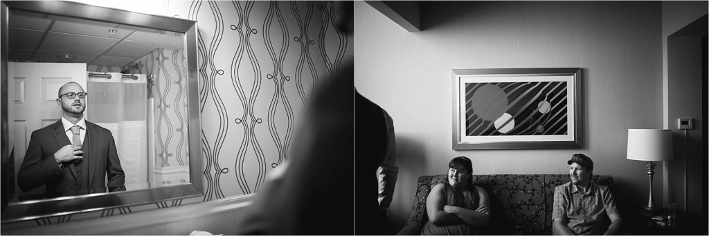 Black and white wedding image groom prepping for wedding