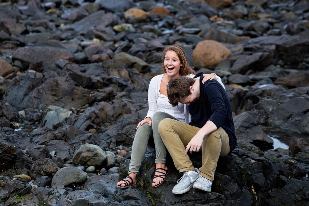 Siblings laughing on the rocks York Beach Maine Family Photo