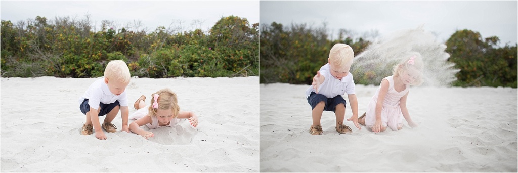 Little kids throwing sand on beach Pemaquid Beach Maine Sarah Jane Photography
