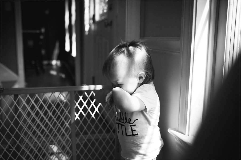 Sad baby during family portrait session Sarah Jane Photography