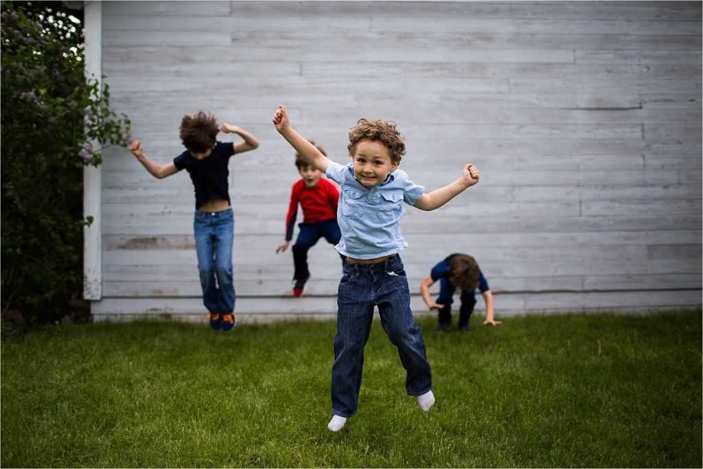 Boy jumping York Maine Family Photographer Vacationland Summertime