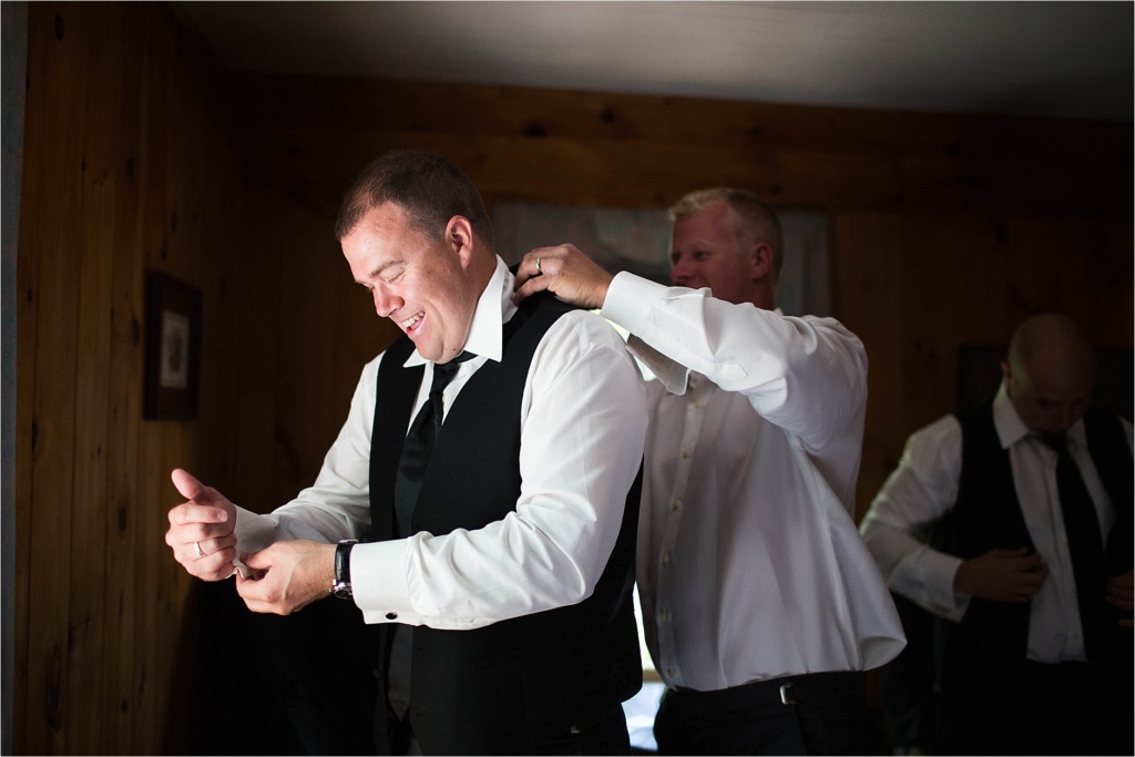 Groom getting ready Maine Wedding Photographer Pleasant Point Inn Lakeside