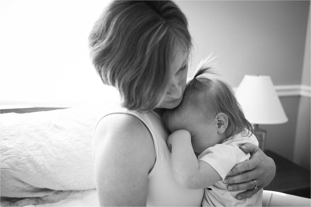 black and white photo of mom consoling a small child brunswick maine family photographer