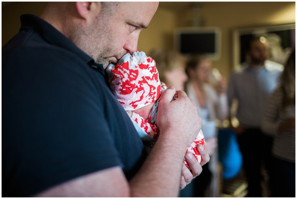 Dad and newborn baby girl