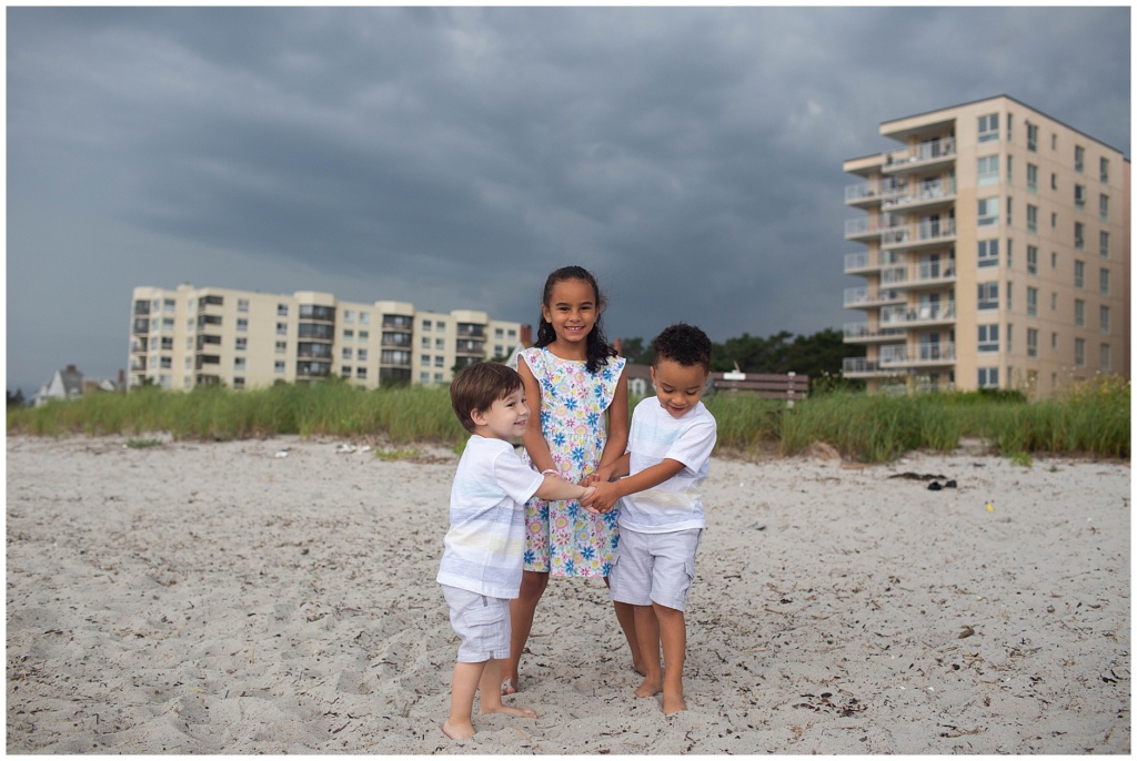 Family portrait session with thunderstorm in the background