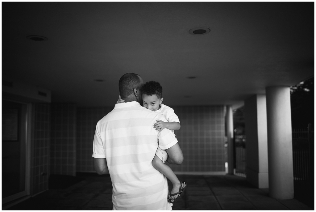 BW Image of Dad holding small boy in his arms OOB Maine